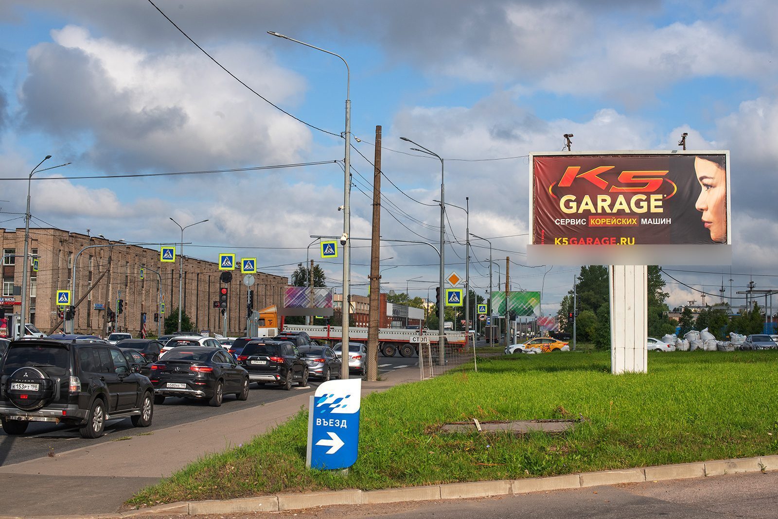 Фотография рекламного носителя, тип: Билборд 3x6, адрес: Краснопутиловская ул., д.46, корп.3 Х Народного Ополчения пр-т., Санкт-Петербург, Россия. Сторона A №170152