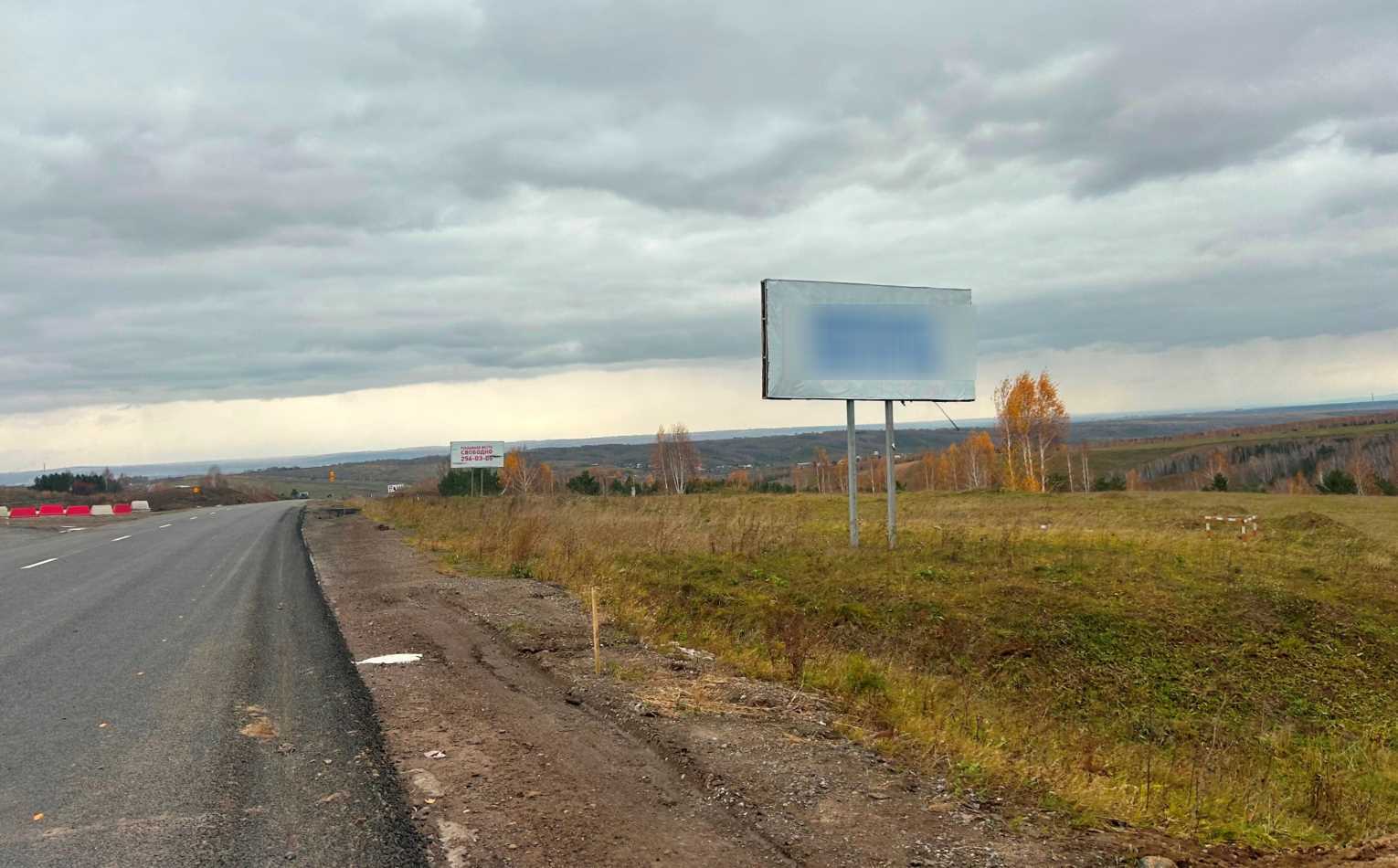 Фотография рекламного носителя, тип: Билборд 3x6, адрес: М-53 а/д., 857 470м, Красноярский край, Россия. Сторона А №1361834