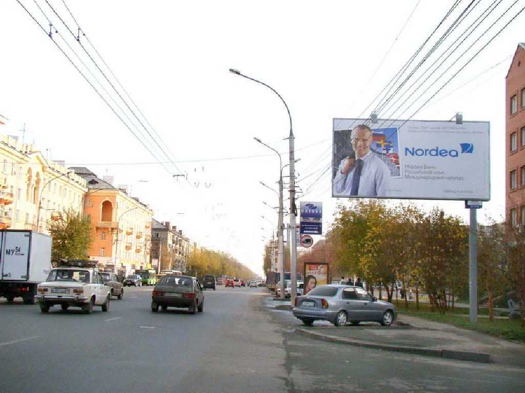 Фотография рекламного носителя, тип: Билборд 3x6, адрес: Дзержинского пр-т., д.14/3, Новосибирск, Новосибирская область, Россия. Сторона A №183837