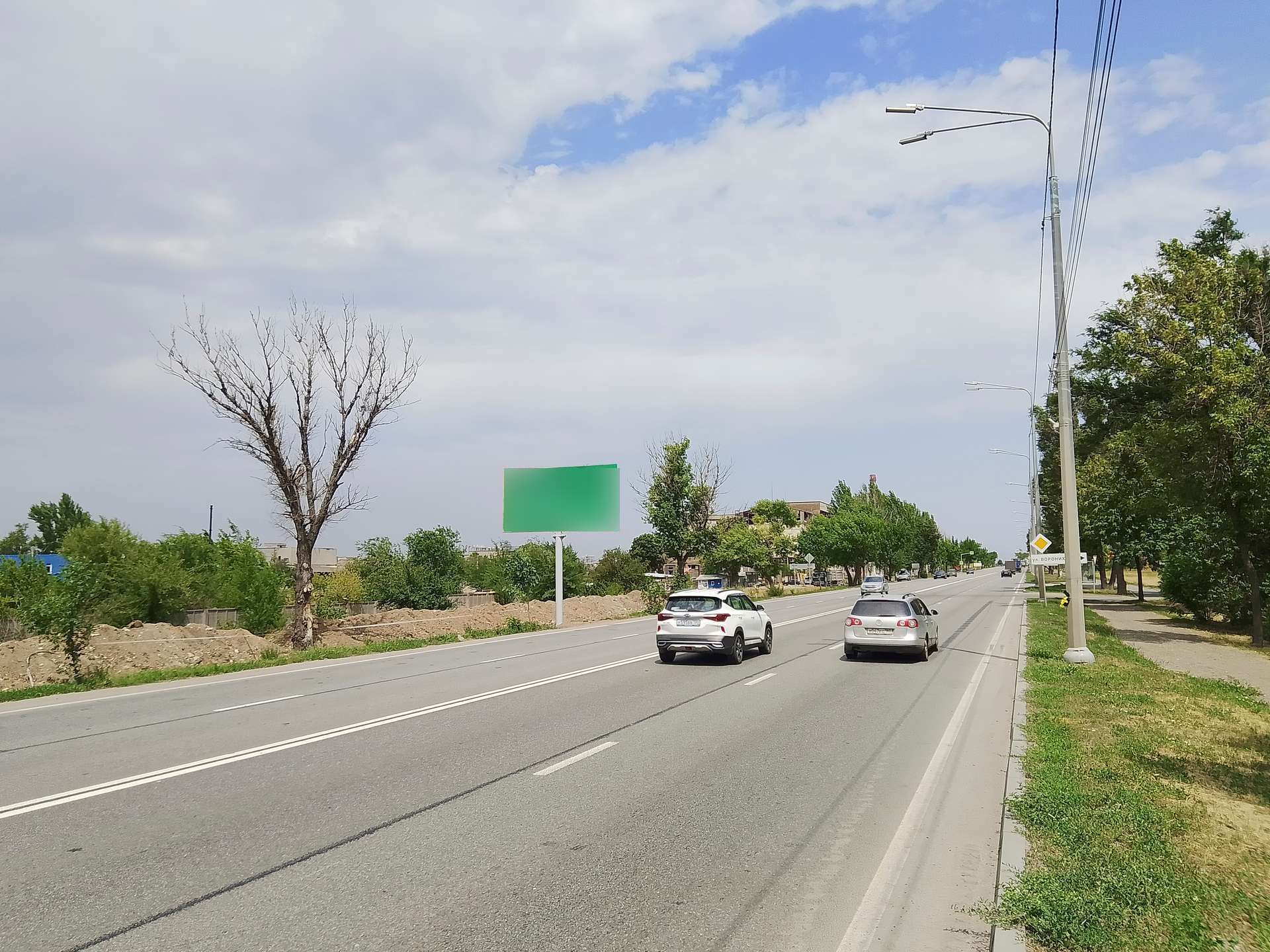 Фотография рекламного носителя, тип: Билборд 3x6, адрес: Таганрогская ул. X Орджоникидзе ул., Мариуполь, Донецкая область, Россия. Сторона B №1372572