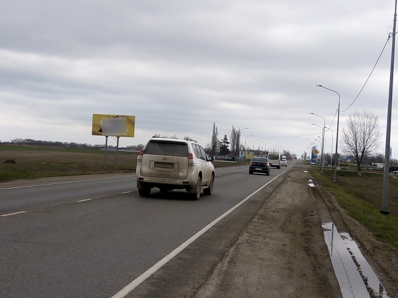 Фотография рекламного носителя, тип: Билборд 3x6, адрес: Светлый Путь Ленина пос., Темрюк-Краснодар а/д, 32 465м, Темрюк, Краснодарский край, Россия. Сторона Б №1336934