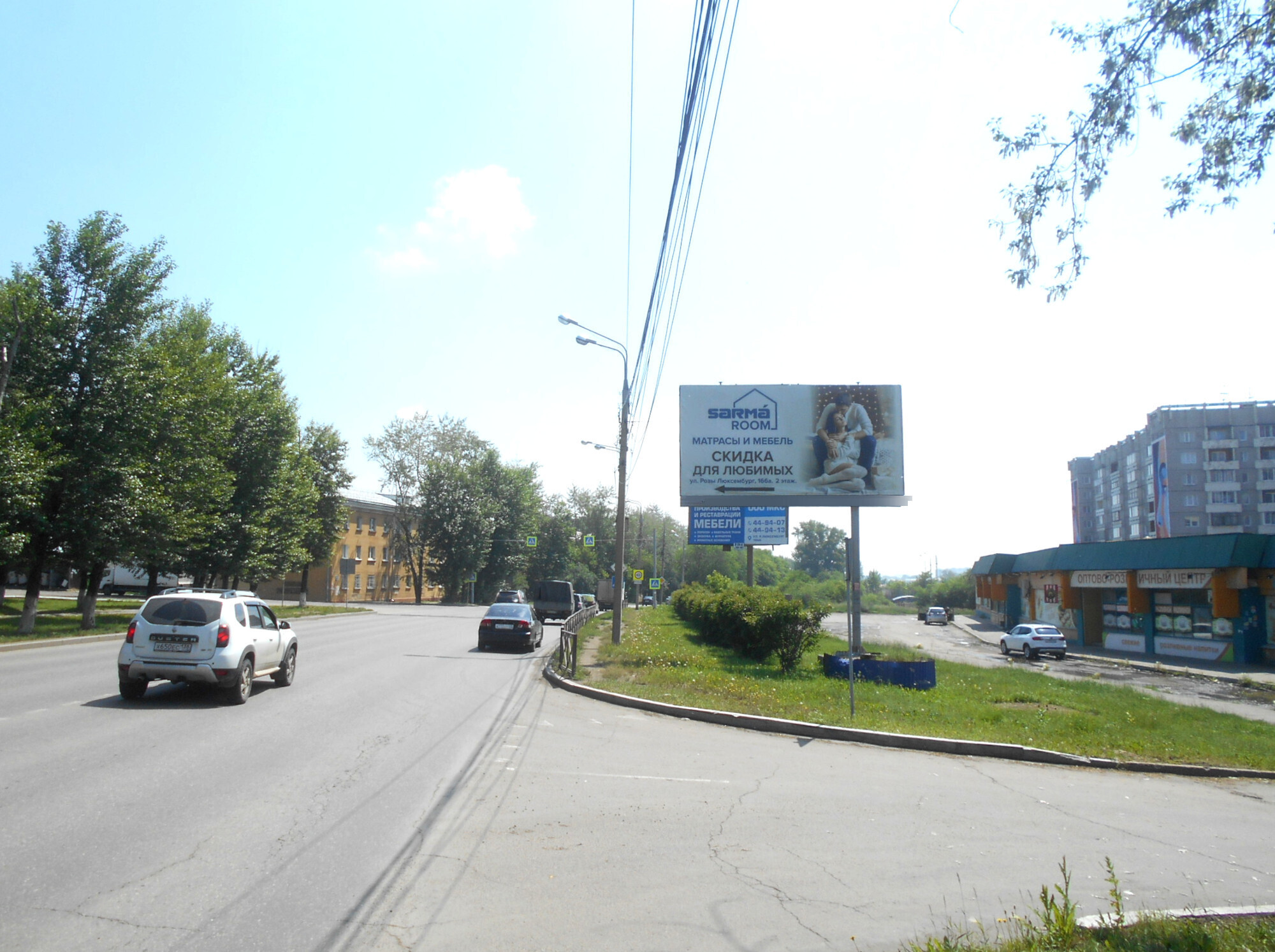 Фотография рекламного носителя, тип: Билборд 3x6, адрес: Р.Люксембург ул. д.195а, Иркутск, Иркутская область, Россия. Сторона А №1072345