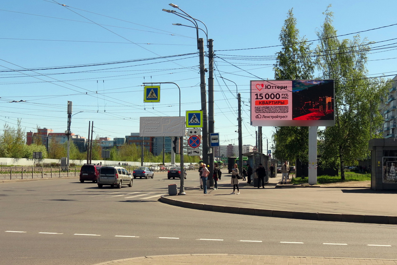Фотография рекламного носителя, тип: Билборд 3x6, адрес: Большевиков пр-т. Х Дыбенко ул., д.27, корп.4, Санкт-Петербург, Россия. Сторона А1 №118518