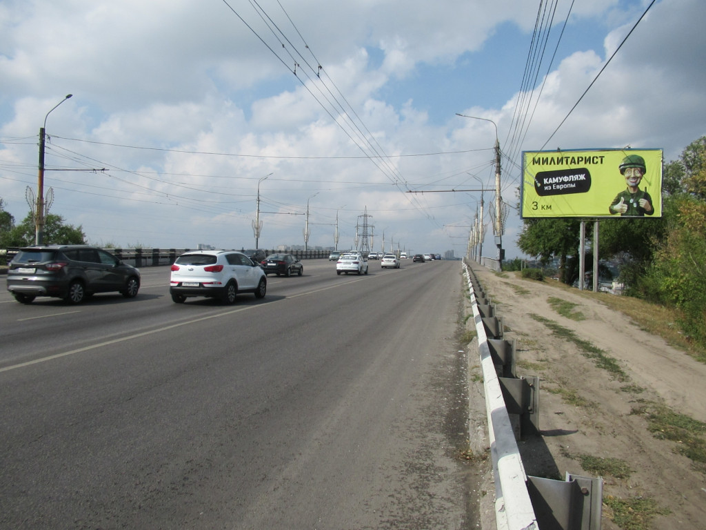 Фотография рекламного носителя, тип: Билборд 3x6, адрес: Дамба ВОГРЭС, заезд на мост, 300м от Героев Стратосферы ул., Воронеж, Воронежская область, Россия. Сторона А №111654