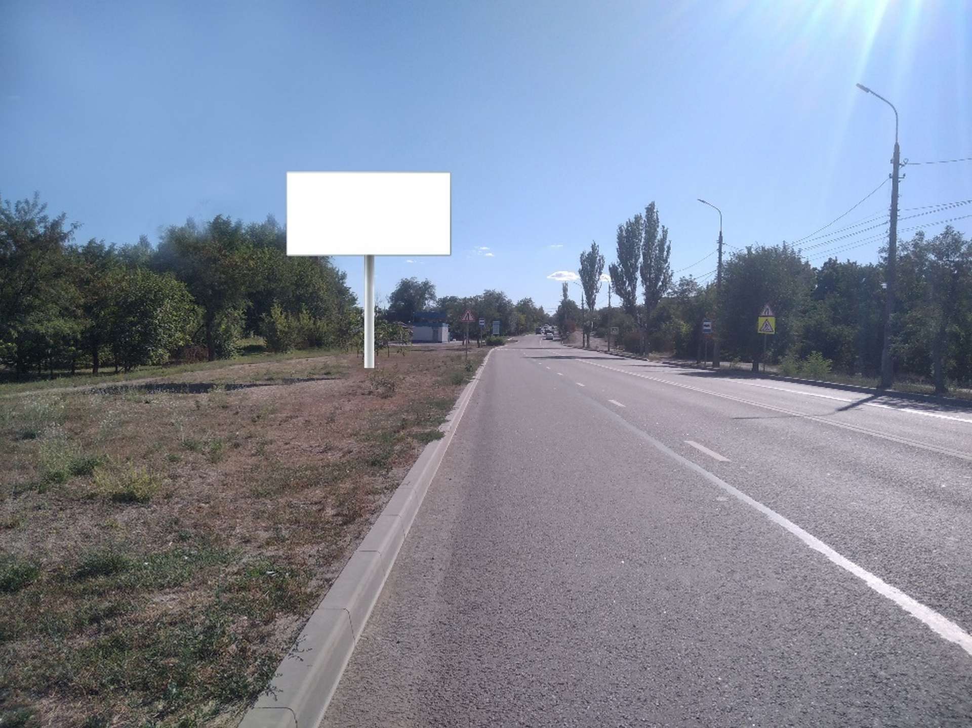 Фотография рекламного носителя, тип: Билборд 3x6, адрес: ул. Заозерная напротив дома 87Б, Мариуполь, Донецкая область, Россия. Сторона Б №1372544