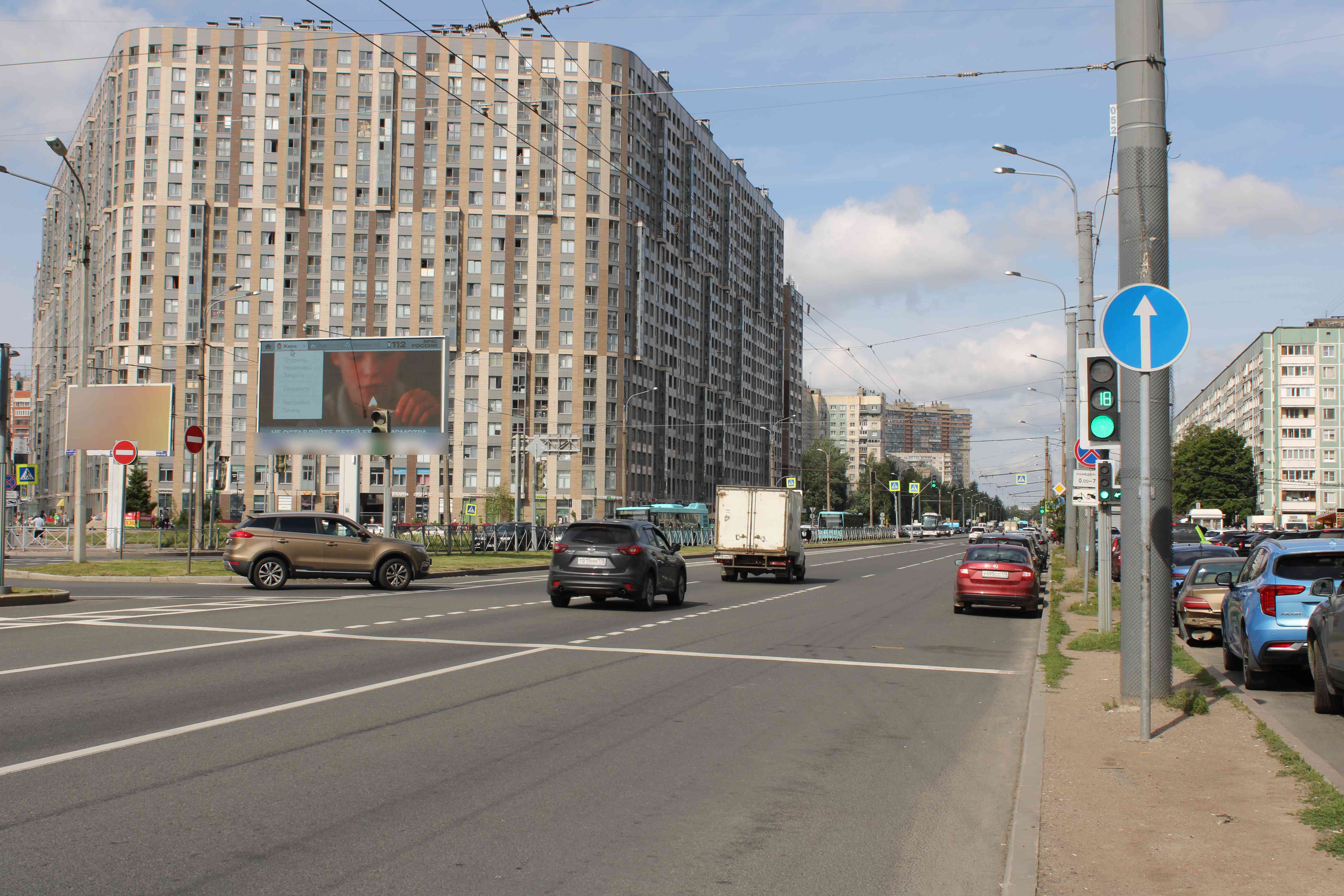 Фотография рекламного носителя, тип: Билборд 3x6, адрес: Просвещения пр-т., д.32, корп.1 Х Хошимина ул., Санкт-Петербург, Россия. Сторона А1 №120575