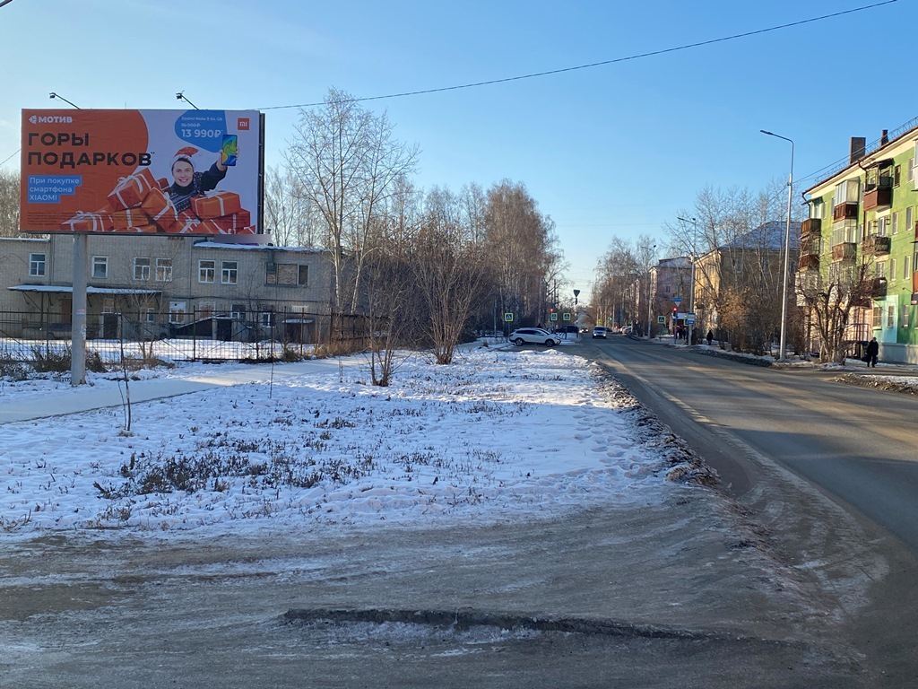 Фотография рекламного носителя, тип: Билборд 3x6, адрес: Розы Люксембург ул., д.8, Полевской, Свердловская область, Россия. Сторона Б №522973