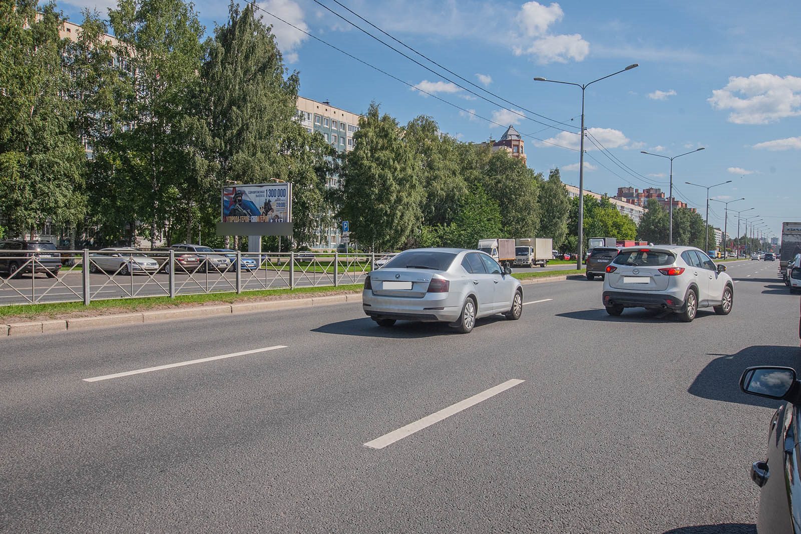 Фотография рекламного носителя, тип: Билборд 3x6, адрес: Северный пр-т., д.12, Санкт-Петербург, Россия. Сторона B №169262