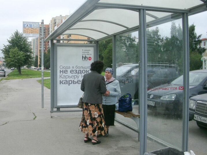 Фотография рекламного носителя, тип: Остановка 1.8x1.2, адрес: Маршала Захарова пр-т., д.56, Санкт-Петербург, Россия. Сторона А №130202