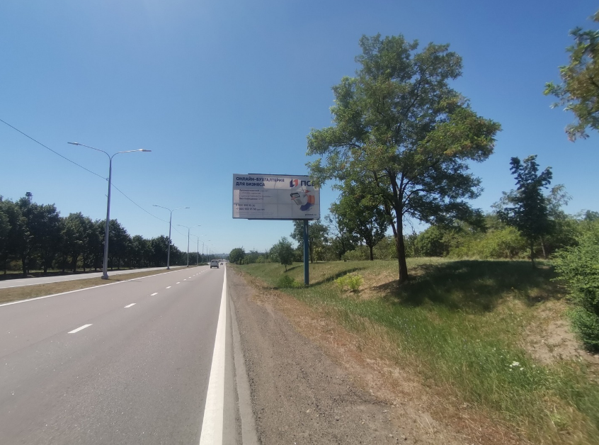 Фотография рекламного носителя, тип: Билборд 3x6, адрес: Донецк-Мариуполь а/д, 4 000м от Сталевара, Мариуполь, Донецкая область, Россия. Сторона A №1361315
