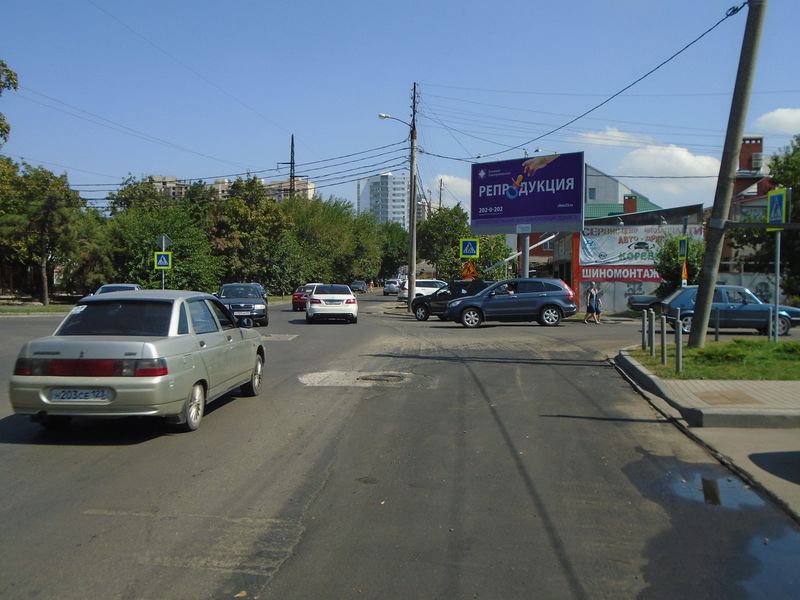 Фотография рекламного носителя, тип: Билборд 3x6, адрес: Гаражная ул., д.132 Х Дальняя ул., Краснодар, Краснодарский край, Россия. Сторона А №234303