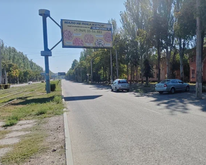 Фотография рекламного носителя, тип: Билборд 3x6, адрес: Ленина пр-т., д.48 Х Димитрова ул., Горловка, Донецкая область, Россия. Сторона А №1326957