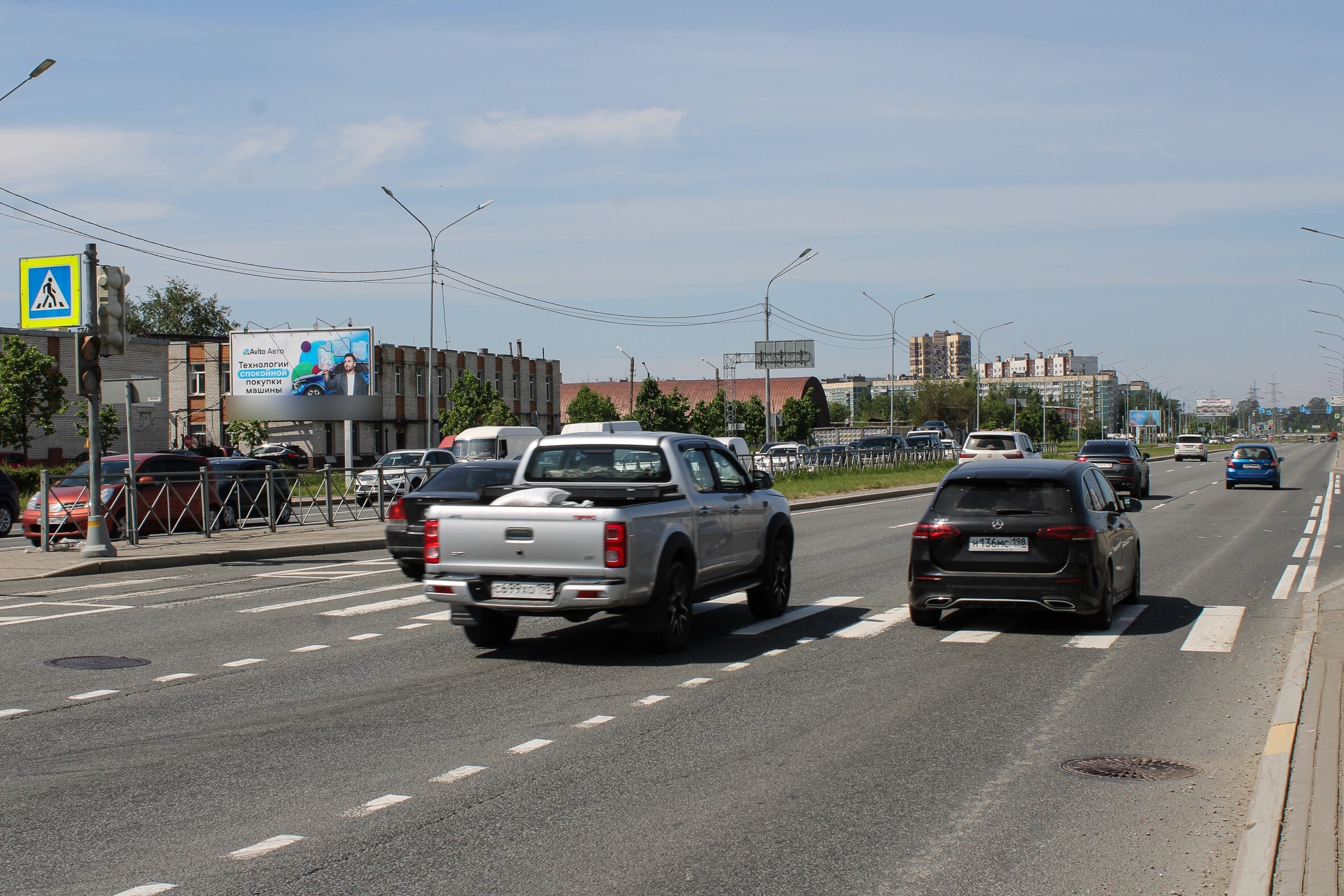 Фотография рекламного носителя, тип: Билборд 3x6, адрес: Суздальский пр-т. Х Симонова ул., д.16, Санкт-Петербург, Россия. Сторона Б №639613