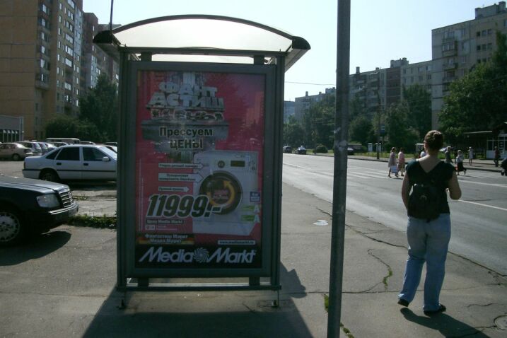 Фотография рекламного носителя, тип: Остановка 1.8x1.2, адрес: Маршала Захарова пр-т., д.56, Санкт-Петербург, Россия. Сторона Б №130203