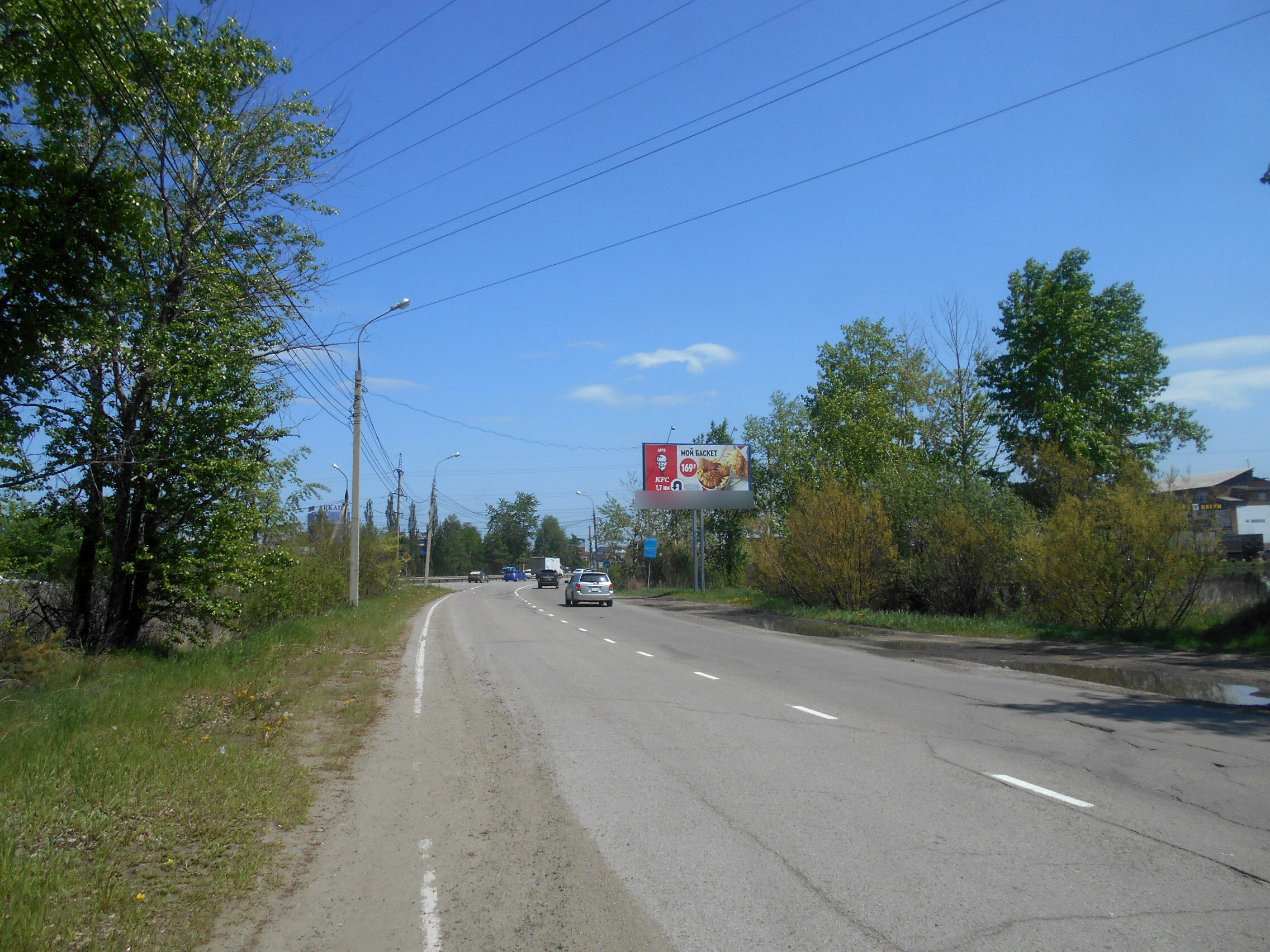 Фотография рекламного носителя, тип: Билборд 3x6, адрес: Трактовая ул., выезд О. Кошевого ул., Иркутск, Иркутская область, Россия. Сторона А №246016