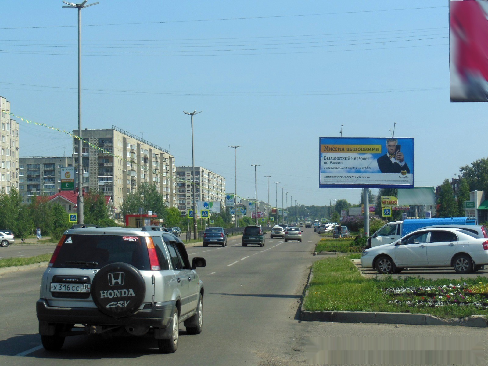 Фотография рекламного носителя, тип: Билборд 3x6, адрес: Ангарский пр-т., магазин "Октябрьский", Ангарск, Иркутская область, Россия. Сторона А №153700