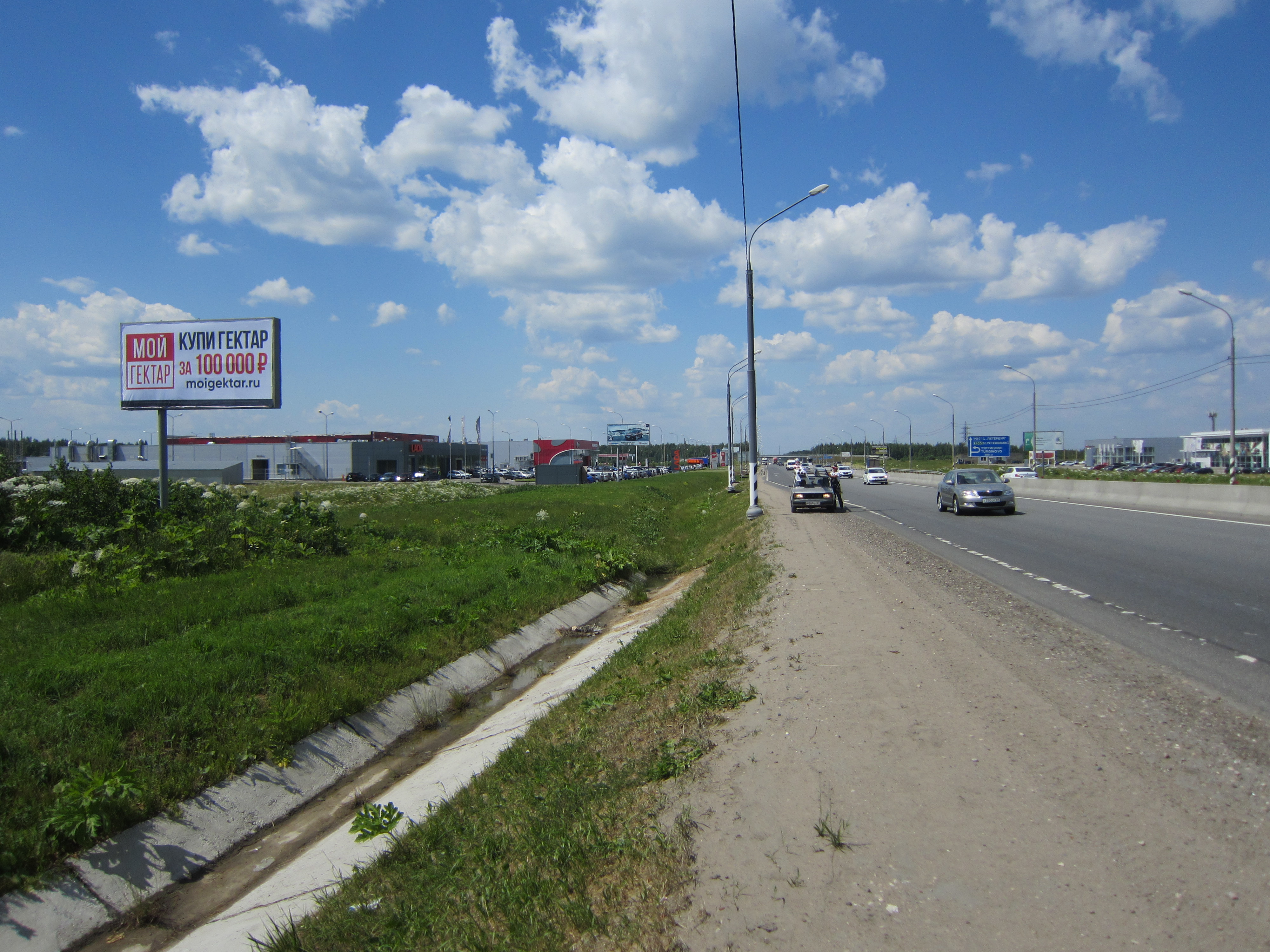 Фотография рекламного носителя, тип: Билборд 3x6, адрес: Окружная М10 а/д., 164 607м, Тверь, Тверская область, Россия. Сторона Б №544826