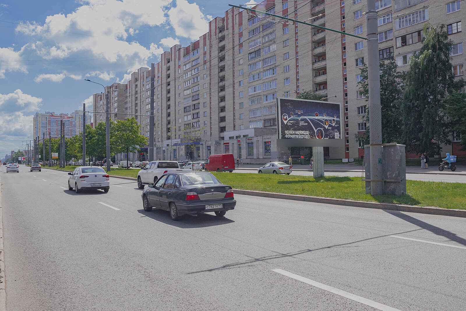 Фотография рекламного носителя, тип: Билборд 3x6, адрес: Просвещения пр-т., д.35 Х Ивана Фомина ул., Санкт-Петербург, Россия. Сторона А №164437