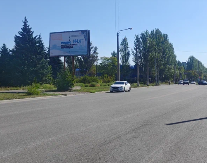 Фотография рекламного носителя, тип: Билборд 3x6, адрес: Ленина пр-т., д.61 Х Димитрова ул., Горловка, Донецкая область, Россия. Сторона Б №1326962