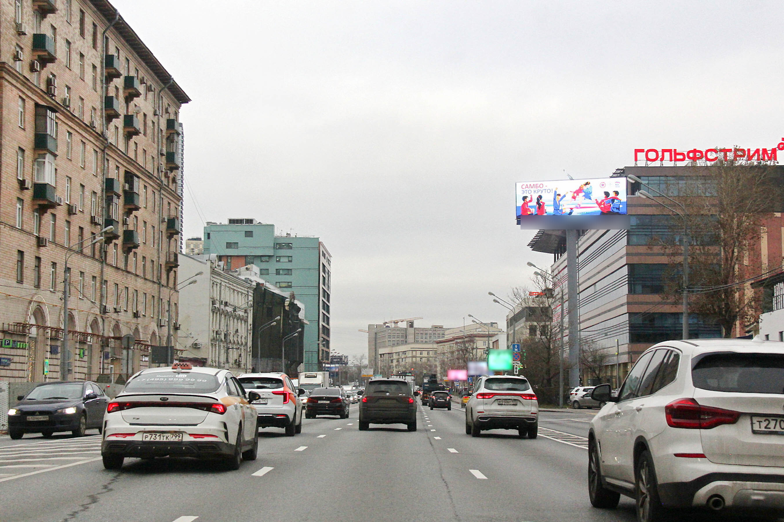 Фотография рекламного носителя, тип: Суперсайт 5x12, адрес: Бутырская ул., д.65, Москва, Россия. Сторона А1 №94878