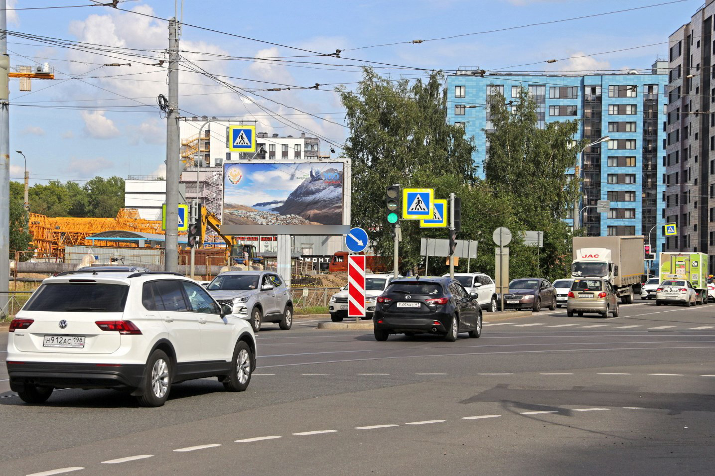 Фотография рекламного носителя, тип: Билборд 3x6, адрес: Оптиков ул., д.2, Санкт-Петербург, Россия. Сторона Б №658436