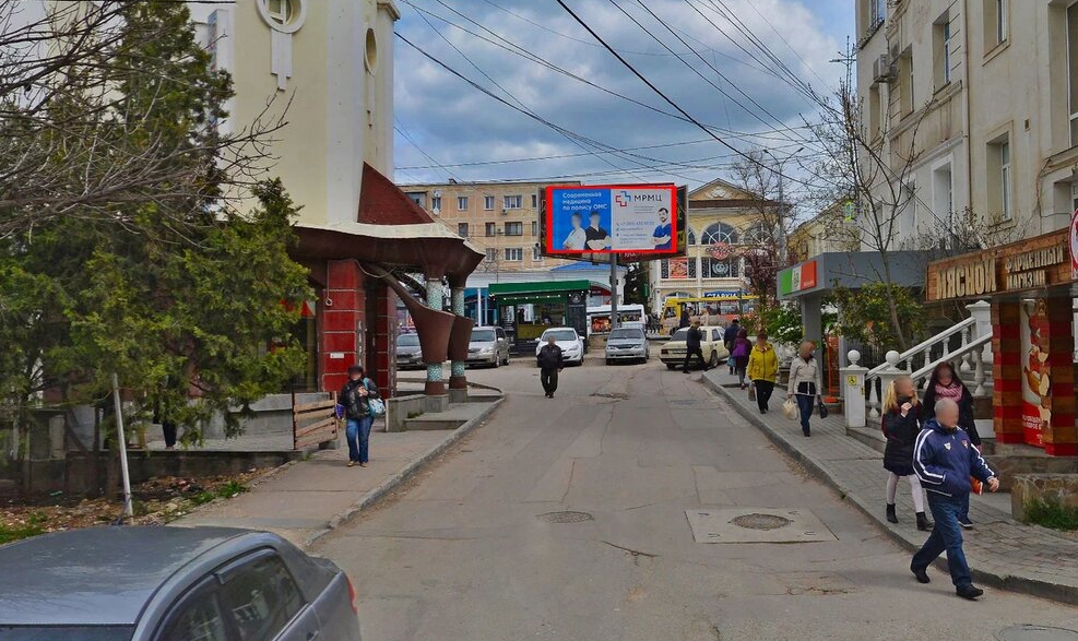 Фотография рекламного носителя, тип: Билборд 3x6, адрес: Октябрьской Революции пр-т., ост. Юмашева, Севастополь, Россия. Сторона С №364896