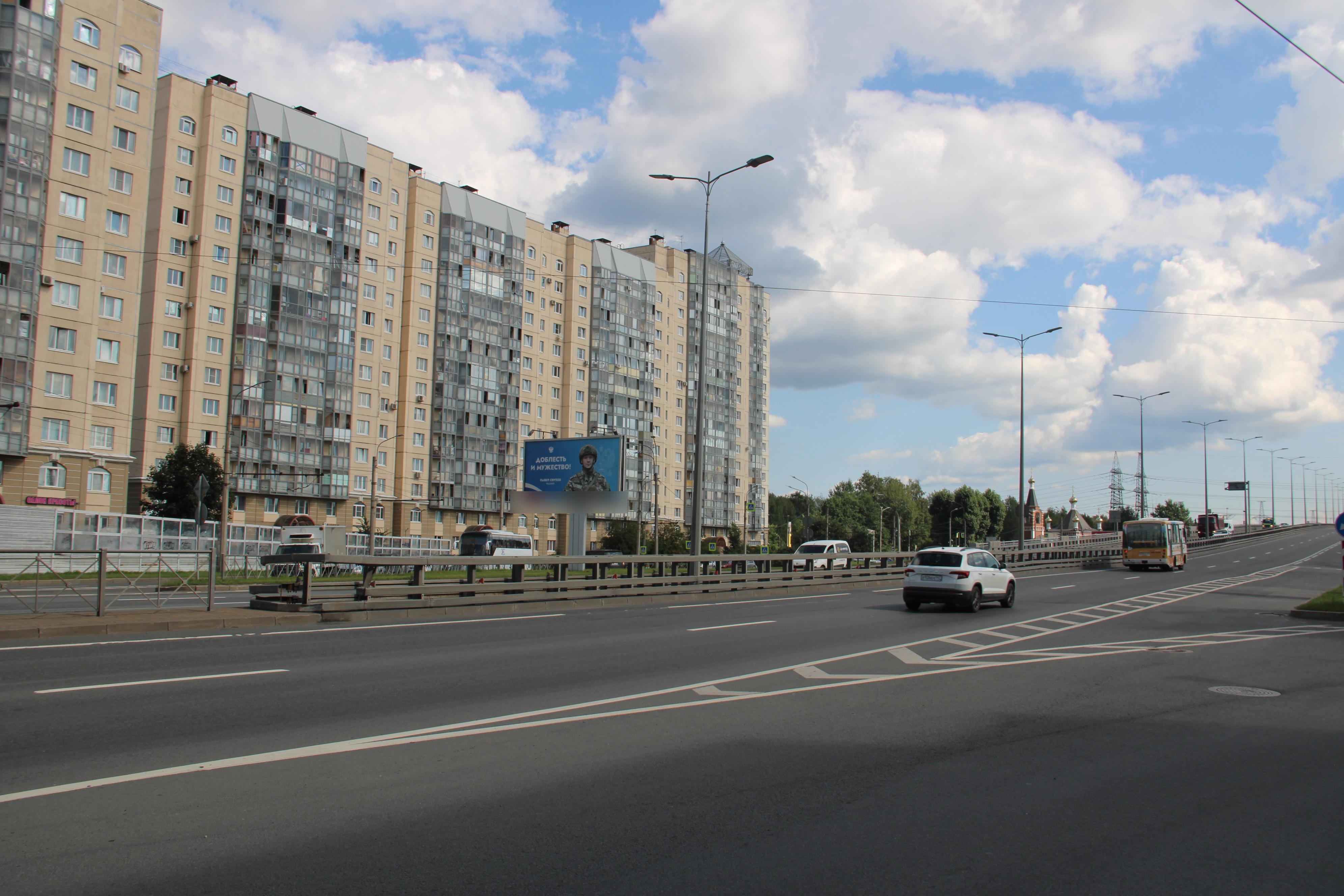 Фотография рекламного носителя, тип: Билборд 3x6, адрес: Косыгина пр-т. Х Комуны ул., Санкт-Петербург, Россия. Сторона Б №106878