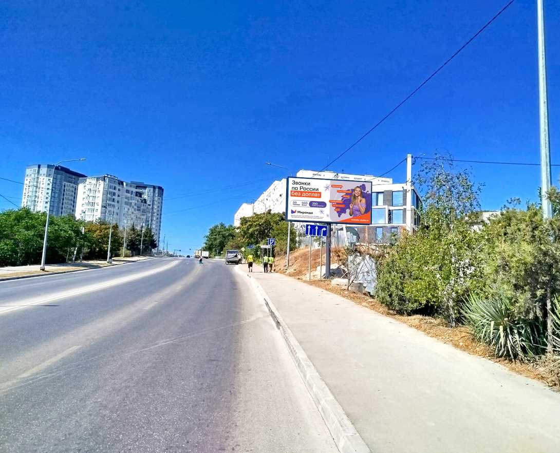 Фотография рекламного носителя, тип: Билборд 3x6, адрес: Александра Маринеско ул. Х Молодых строителей ул., д.25В, Евпатория, Республика Крым, Россия. Сторона A №1377057