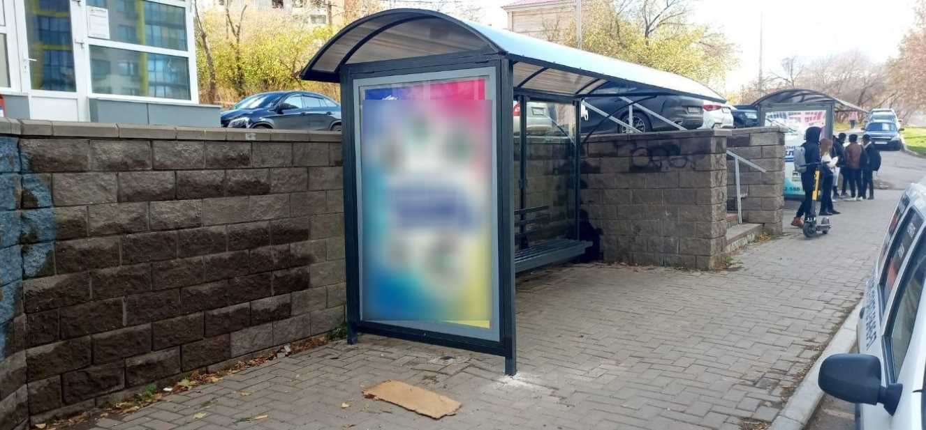 Фотография рекламного носителя, тип: Остановка 1.8x1.2, адрес: Ураксина ул., д.2, поз.1, Уфа, Республика Башкортостан, Россия. Сторона В №1330390