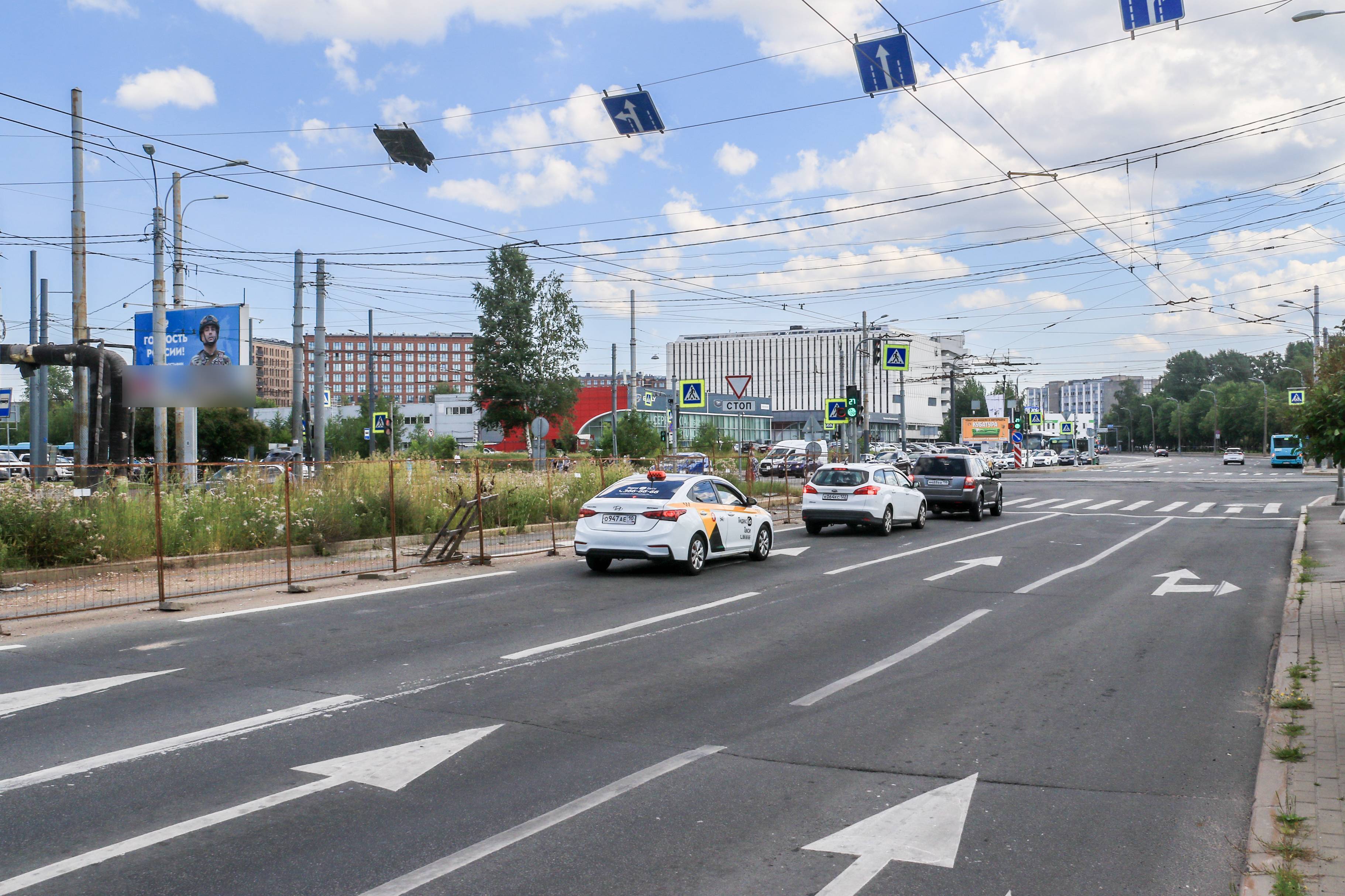 Фотография рекламного носителя, тип: Билборд 3x6, адрес: Кораблестроителей ул., д.48, корп.2 Х Наличная ул., Санкт-Петербург, Россия. Сторона Б1 №719386