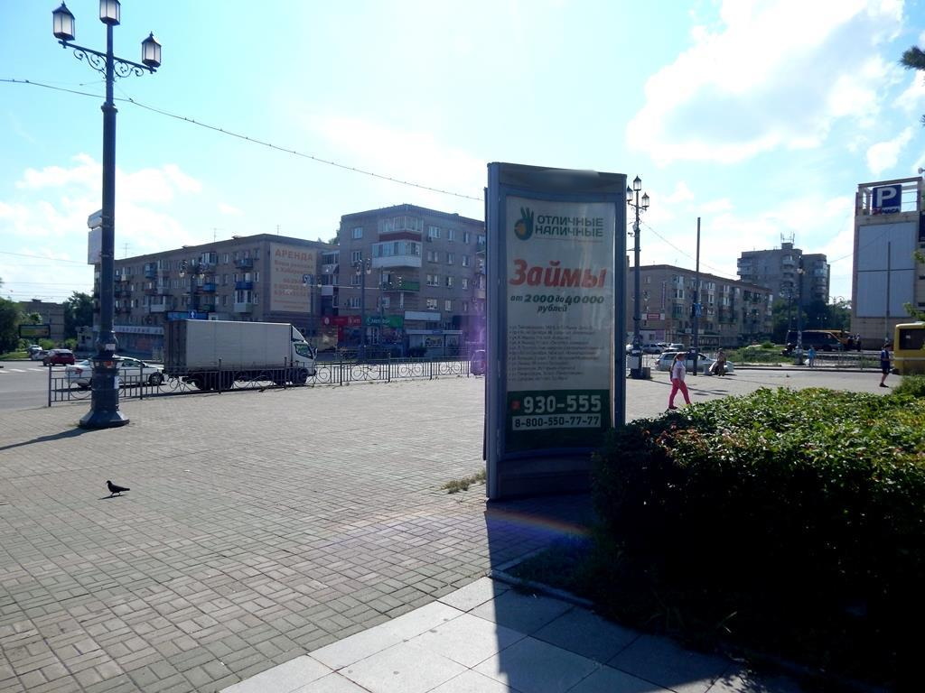 Фотография рекламного носителя, тип: Пиллар 3x1.4, адрес: Привокзальная пл., Автостоянка, Хабаровск, Хабаровский край, Россия. Сторона С №92641