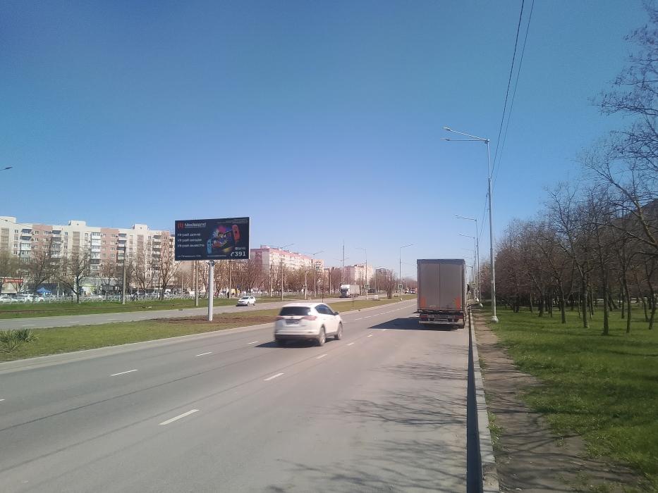 Фотография рекламного носителя, тип: Билборд 3x6, адрес: Шевченко б-р., д.264, Мариуполь, Донецкая область, Россия. Сторона A2 №1398036