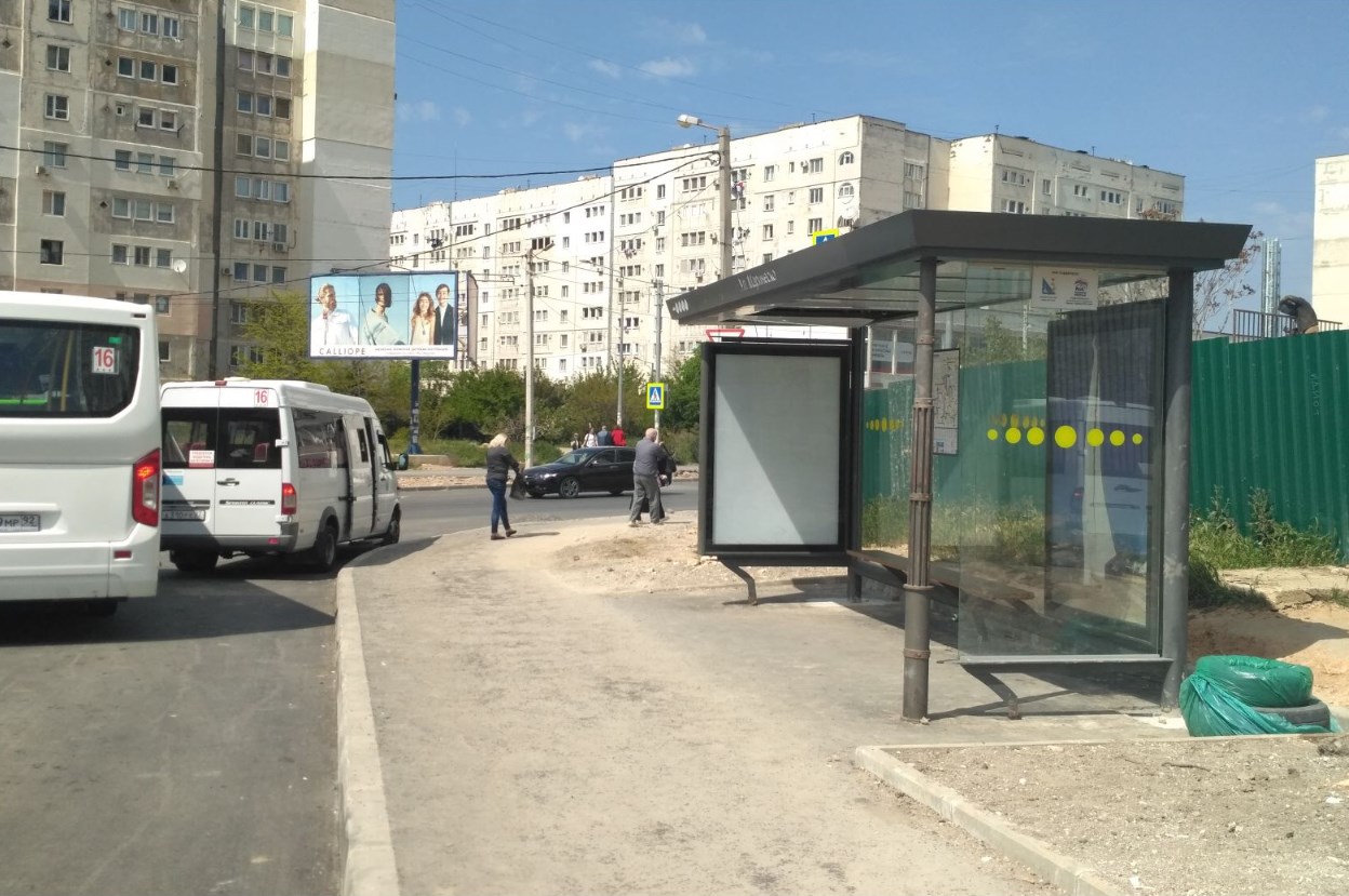 Фотография рекламного носителя, тип: Остановка 1.8x1.2, адрес: Александра Маринеско, ост. Улица Маринеско, кольцо, Севастополь, Россия. Сторона A1 №873528