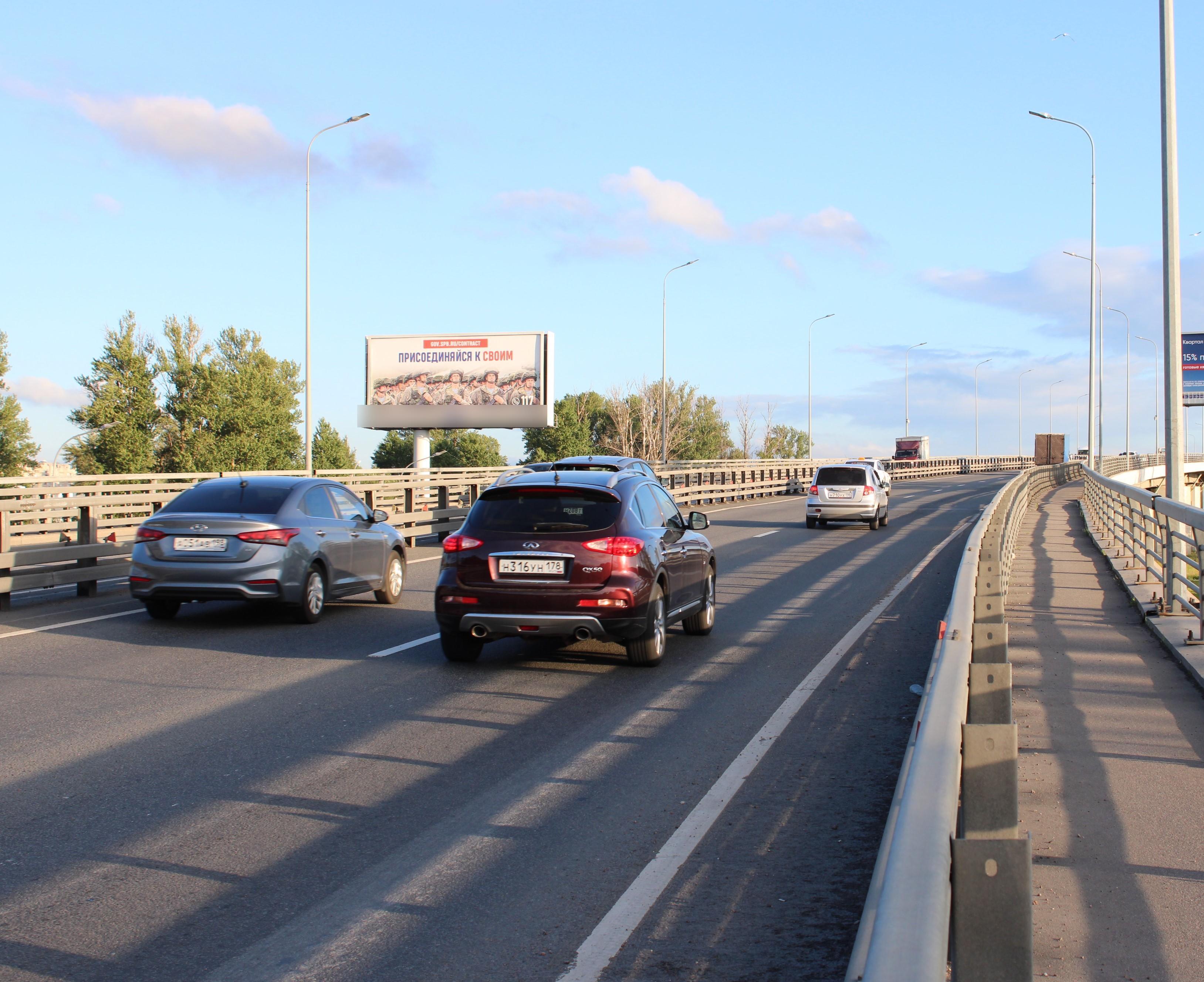 Фотография рекламного носителя, тип: Суперсайт 5x12, адрес: Митрофаньевское ш. Х Рощинская ул., Санкт-Петербург, Россия. Сторона Б №1079749
