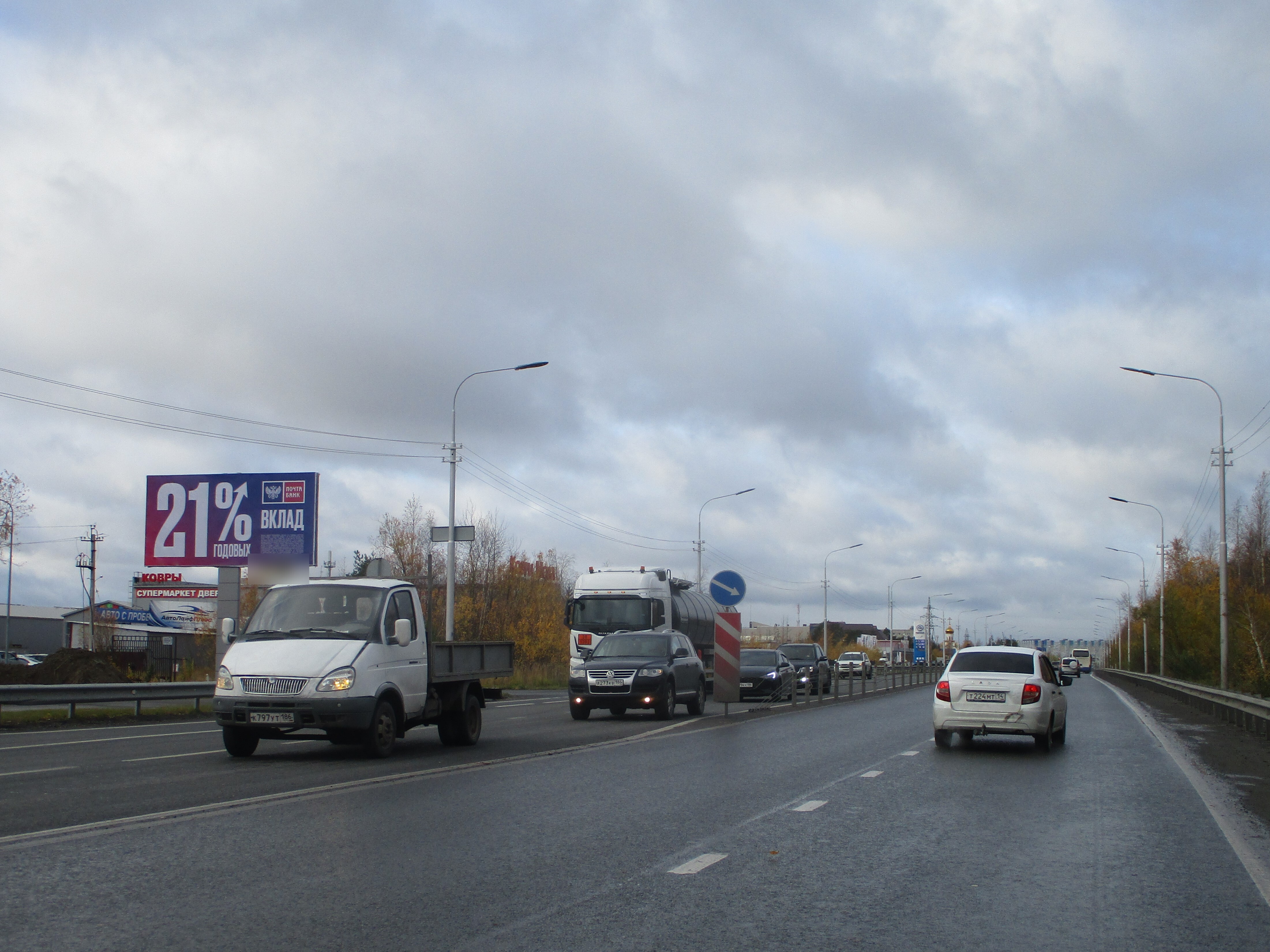 Фотография рекламного носителя, тип: Билборд 3x6, адрес: Нефтеюганское ш., н-в ТЦ Гулливер, Сургут, Ханты-Мансийский автономный округ – Югра, Россия. Сторона Б №512788