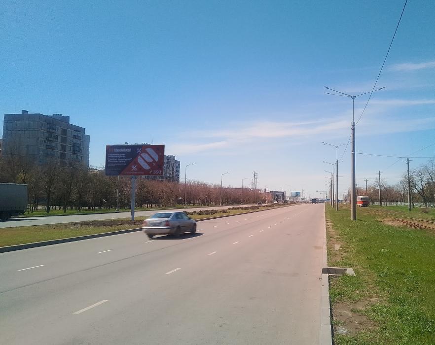 Фотография рекламного носителя, тип: Билборд 3x6, адрес: Шевченко б-р., д.264, Мариуполь, Донецкая область, Россия. Сторона А1 №1372494
