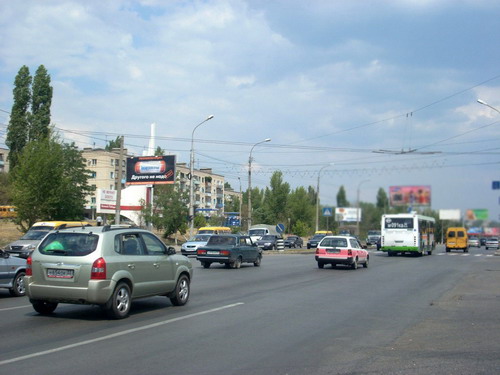Фотография рекламного носителя, тип: Билборд 3x6, адрес: Университетский пр-т. Х Полухина ул., Волгоград, Волгоградская область, Россия. Сторона Б №83004