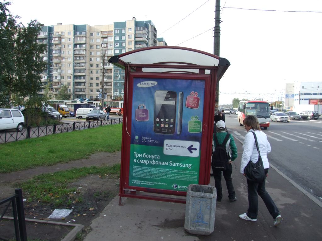 Фотография рекламного носителя, тип: Остановка 1.8x1.2, адрес: Ириновский пр-т., д.33-49, Санкт-Петербург, Россия. Сторона Б №130039