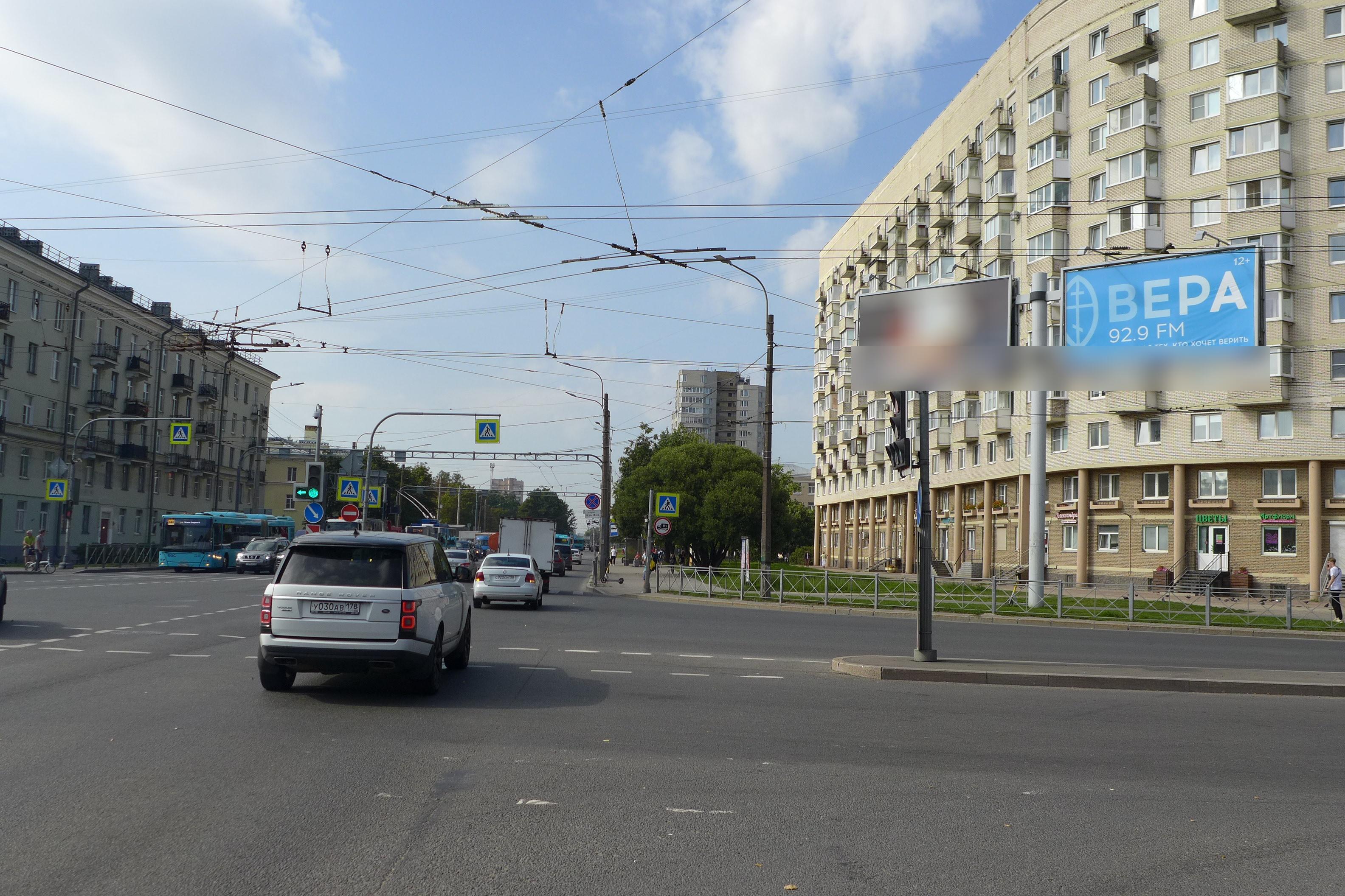 Фотография рекламного носителя, тип: Билборд 3x6, адрес: Непокорённых пр-т., д.14 Х Гражданский пр-т., Санкт-Петербург, Россия. Сторона А2 №1329586