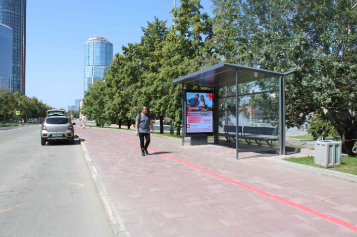 Фотография рекламного носителя, тип: Остановка 1.8x1.2, адрес: Октябрьская пл., д.1, Екатеринбург, Свердловская область, Россия. Сторона А1 №1327889