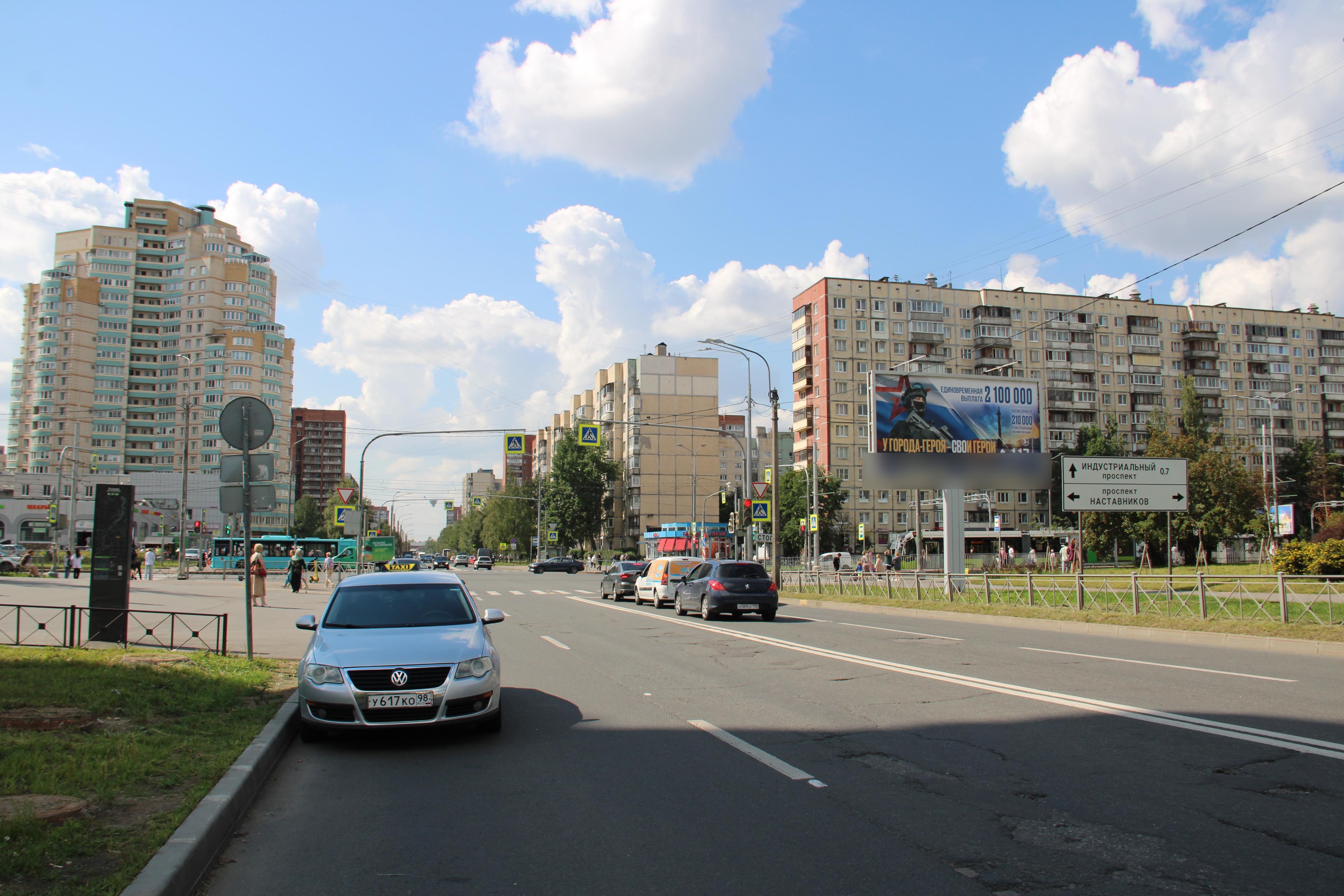 Фотография рекламного носителя, тип: Билборд 3x6, адрес: Ударников пр-т. Х Наставников пр-т., д.45, Санкт-Петербург, Россия. Сторона А №673332