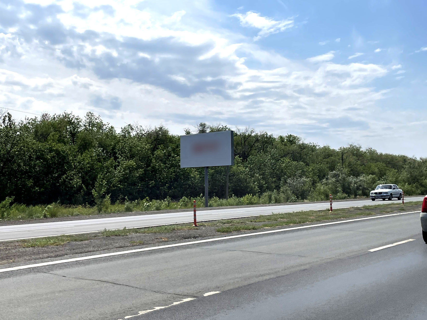 Фотография рекламного носителя, тип: Билборд 3x6, адрес: А-305 а/д, 9 300м, Оренбург, Оренбургская область, Россия. Сторона Б №957701