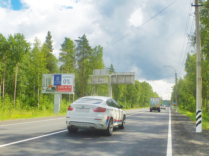 Фотография рекламного носителя, тип: Билборд 3x6, адрес: Зеленогорское ш. Х Скандинавская трасса а/д., Санкт-Петербург, Россия. Сторона B №170344