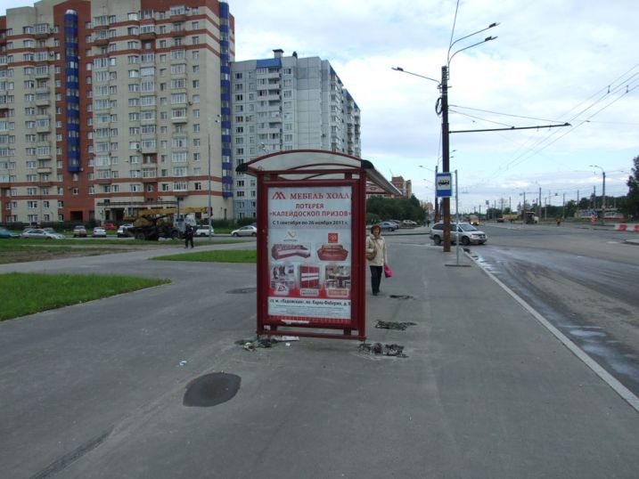 Фотография рекламного носителя, тип: Остановка 1.8x1.2, адрес: Дыбенко ул., д.28, Санкт-Петербург, Россия. Сторона Б №130503