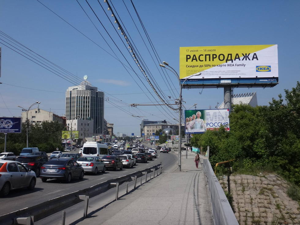 Фотография рекламного носителя, тип: Суперсайт 5x15, адрес: Октябрьская магистраль ул., Новосибирск, Новосибирская область, Россия. Сторона А №127073