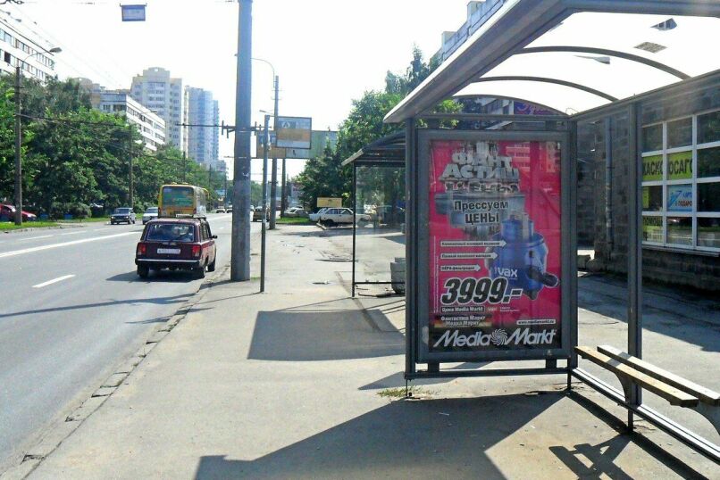 Фотография рекламного носителя, тип: Остановка 1.8x1.2, адрес: Королева пр-т. Х Байконурская ул., Санкт-Петербург, Россия. Сторона А №130762