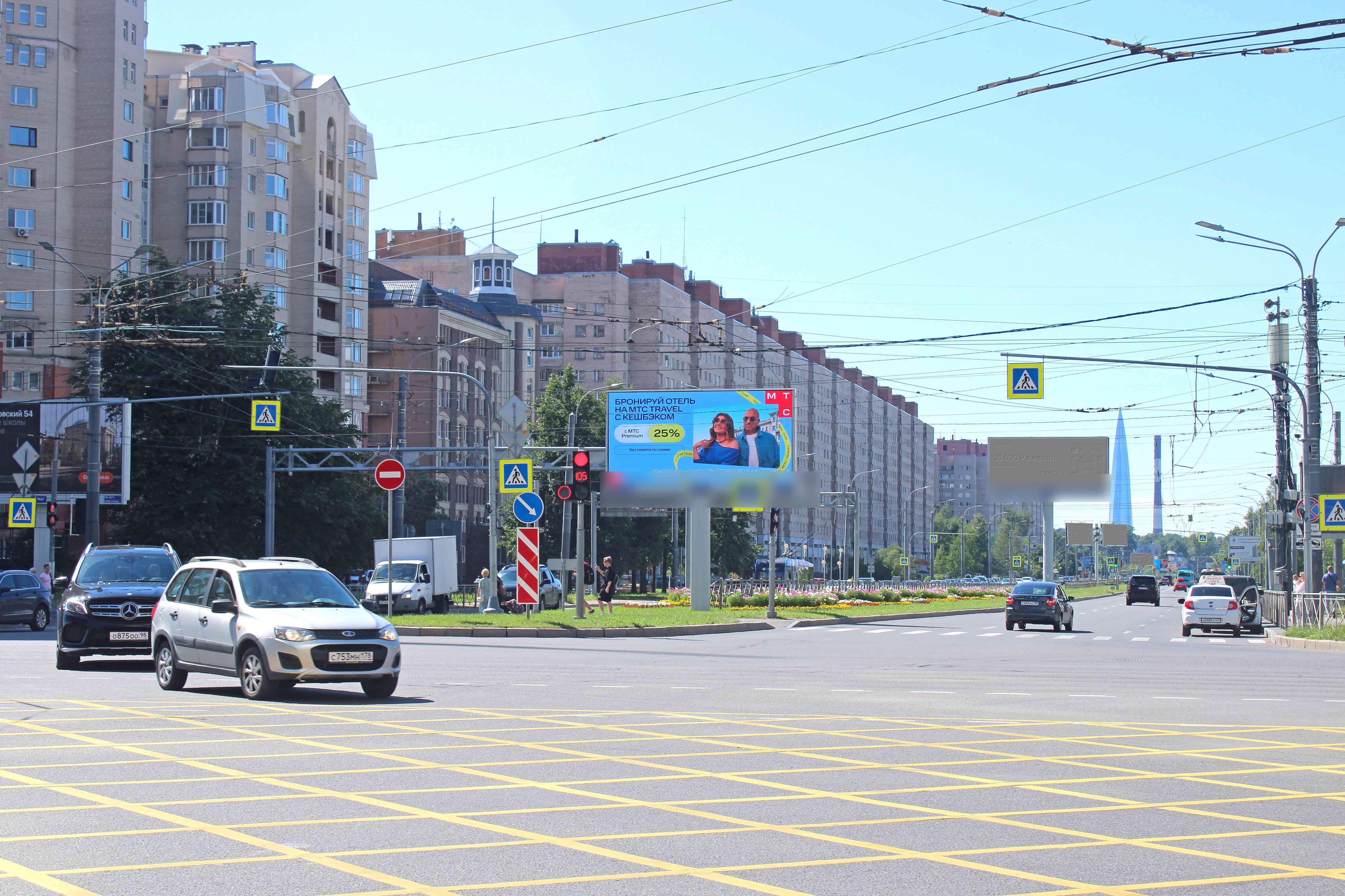 Фотография рекламного носителя, тип: Билборд 3x6, адрес: Богатырский пр-т. X Коломяжский пр-т., д.20, поз.2, Санкт-Петербург, Россия. Сторона А51 №119243