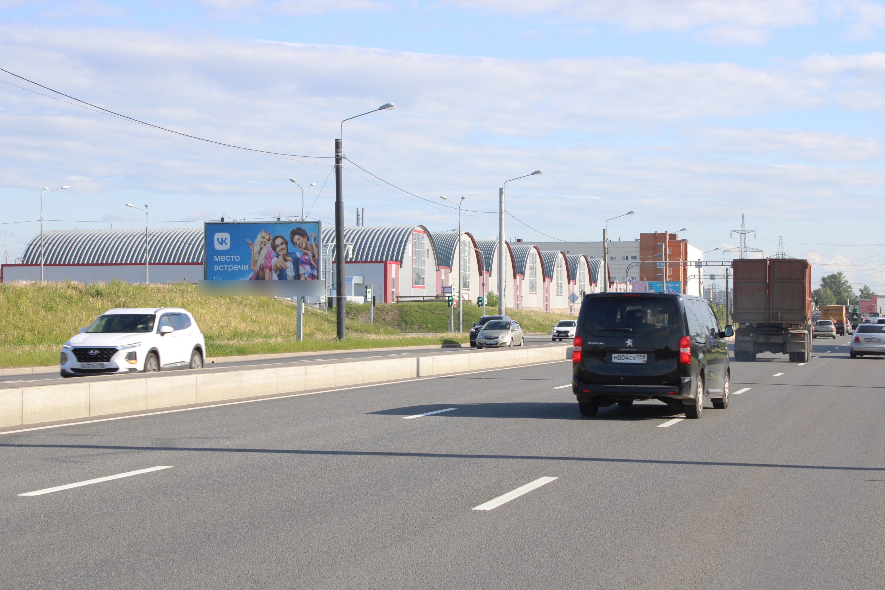 Фотография рекламного носителя, тип: Билборд 3x6, адрес: Индустриальный пр-т., д.70, Санкт-Петербург, Россия. Сторона Б №658990