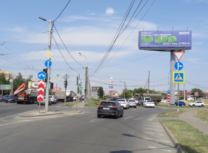 Фотография рекламного носителя, тип: Суперсайт 4x12, адрес: Дзержинского ул. Х Кореновская ул., Краснодар, Краснодарский край, Россия. Сторона А №85207