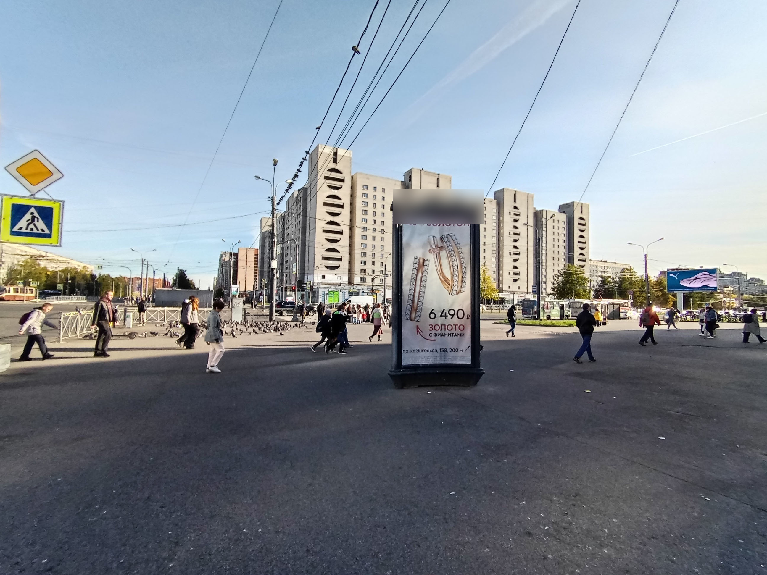 Фотография рекламного носителя, тип: Пиллар 3x1.4, адрес: Просвещения пр-т., д.19 Х Энгельса пр-т., Санкт-Петербург, Россия. Сторона А №144442